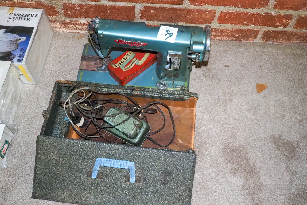 Gimbels deluxe sewing machine Swico Auctions