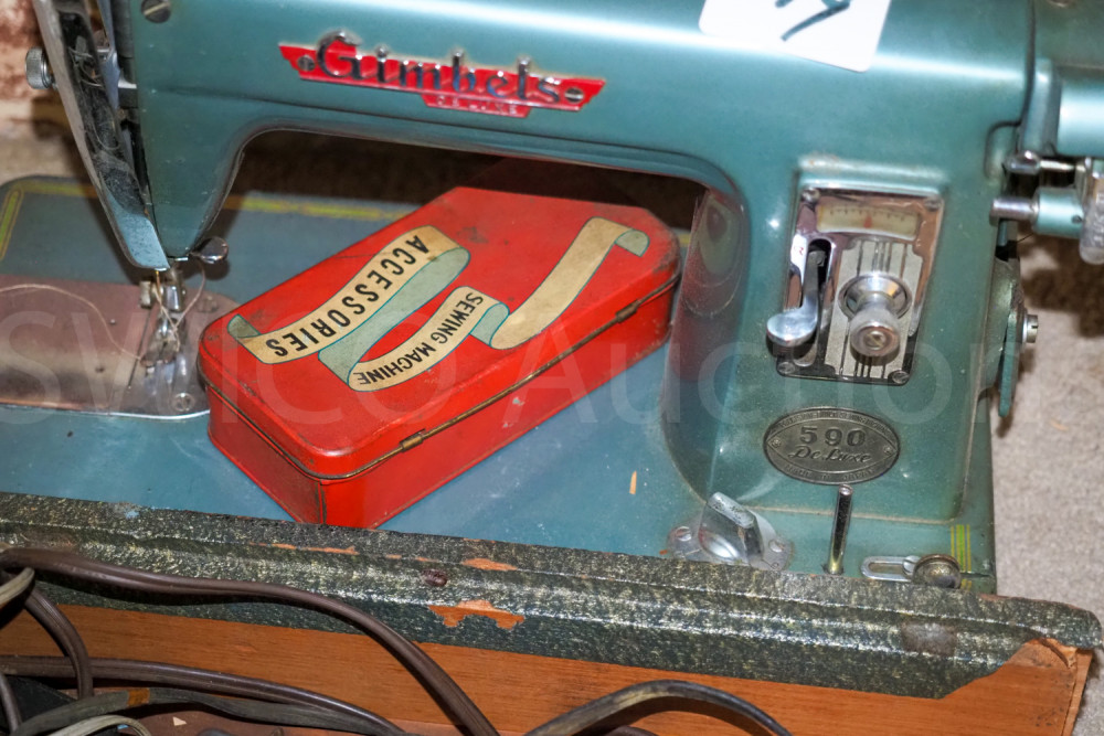 Gimbels deluxe sewing machine - Swico Auctions